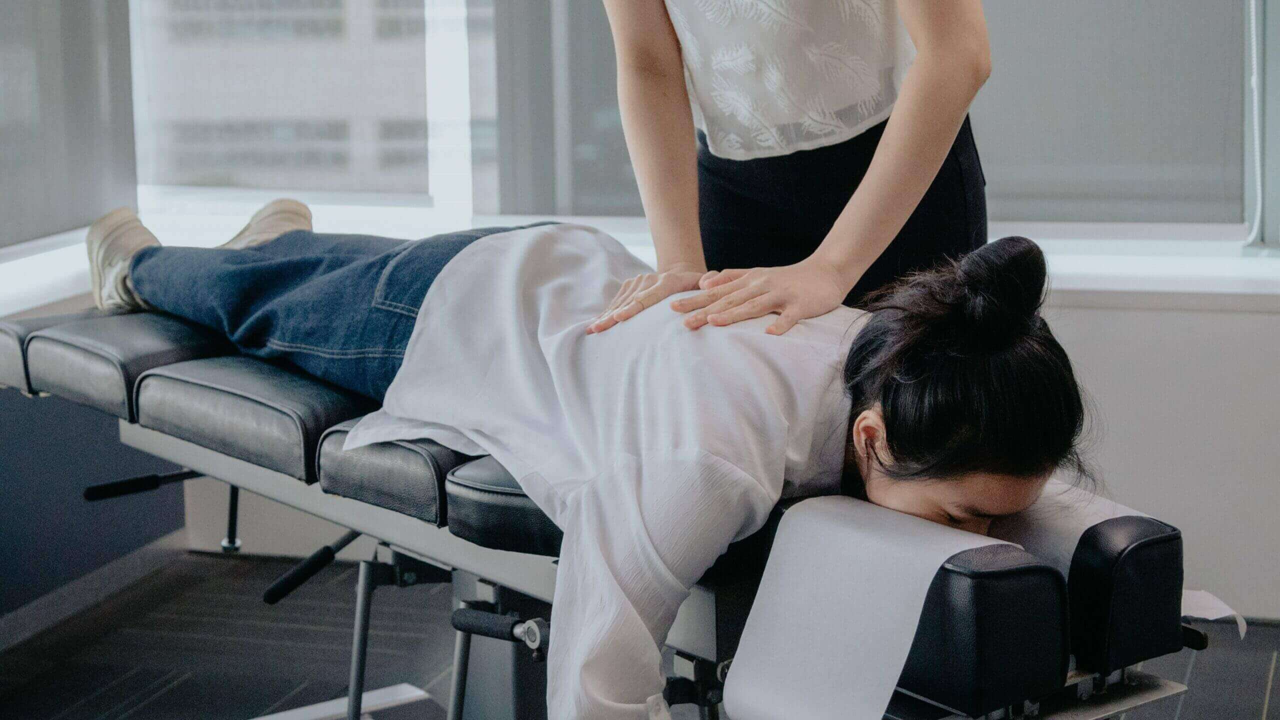 Chiropractor in Scarborough performing a spinal adjustment