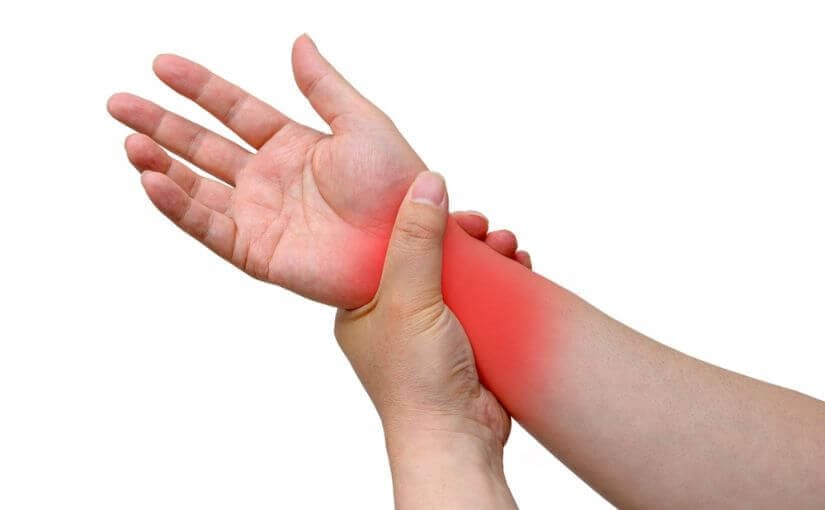 Registered Massage Therapist treating carpal tunnel pain with forearm massage at Massage Well4U RMT Clinic in Scarborough